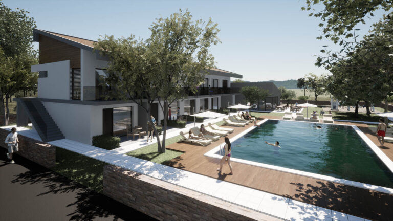 Εξωτερική άποψη του ξενοδοχείου και της αυλής με την πισίνα